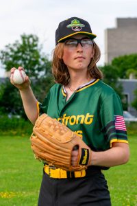 Rand posing with ball and glove for Albany Riverfront Ranger Picture Day 2024.